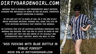 Ass fucking with blue bottle in public forest