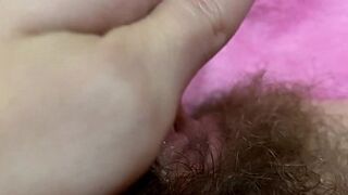 Giant pulsating clitoris cumming in extreme close up with squirting hairy vagina grool play